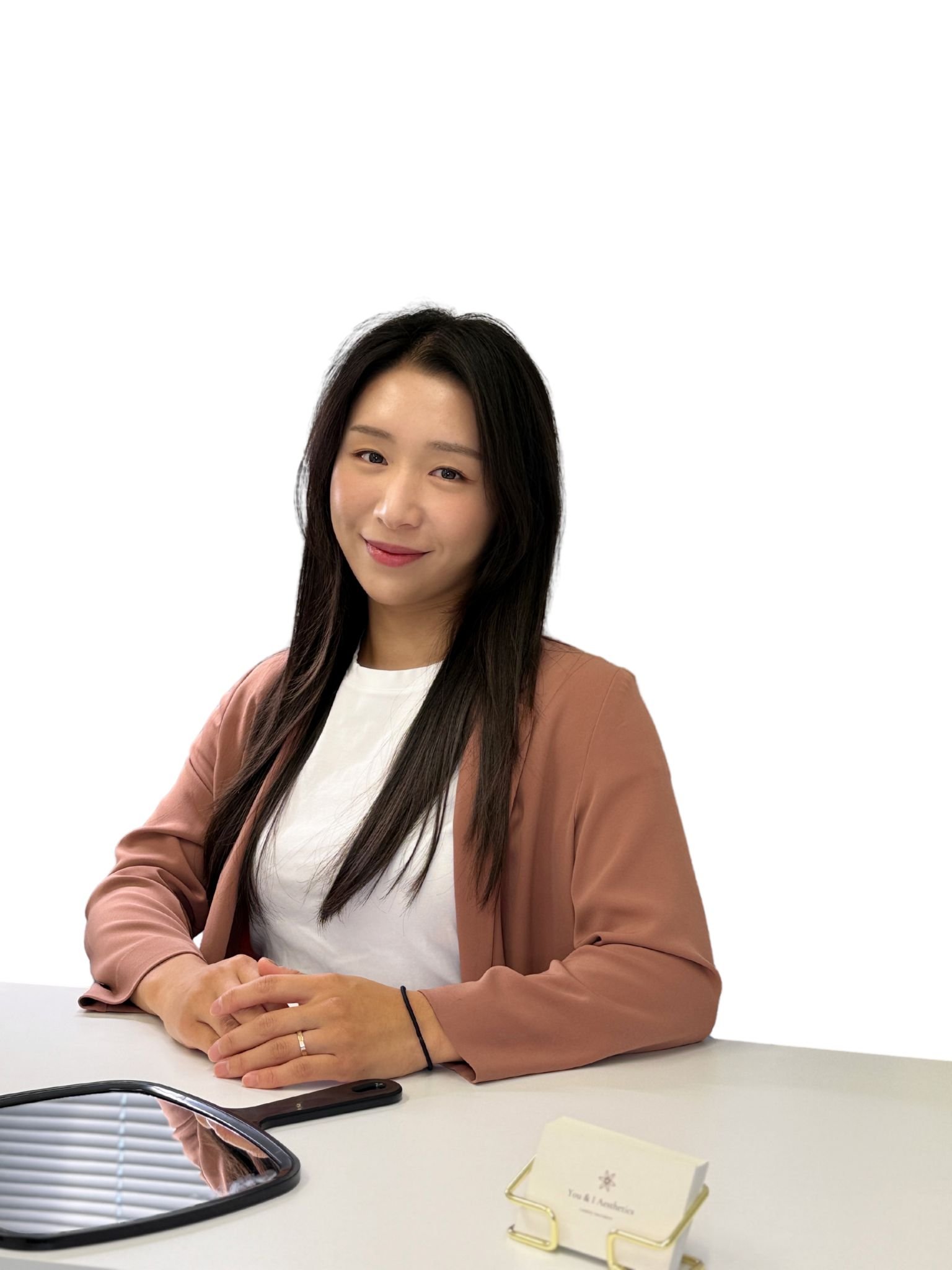 Portrait of a serene, elegant woman with healthy glowing skin in a spa setting